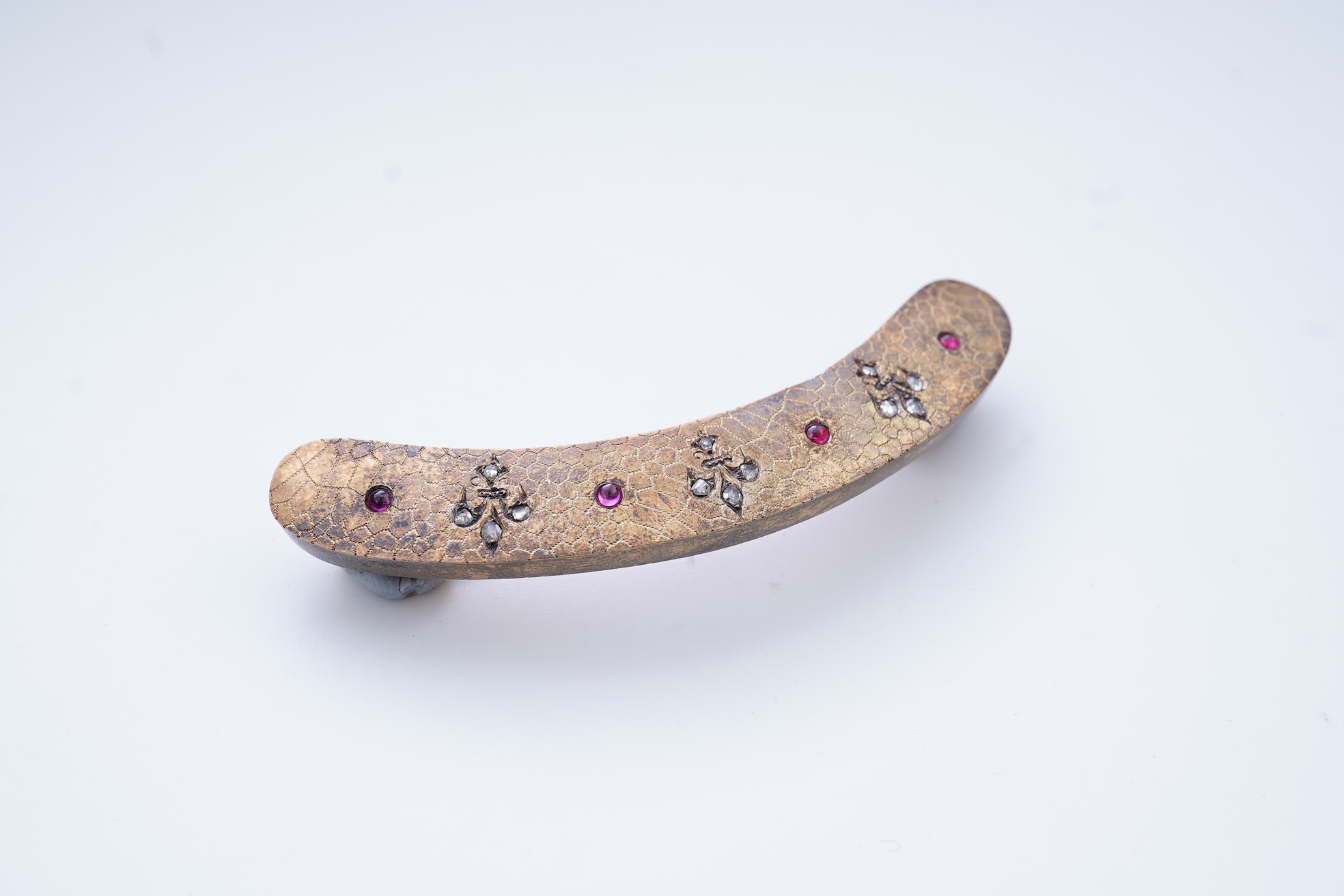 A ruby and diamond brooch, France, circa 1900, composite